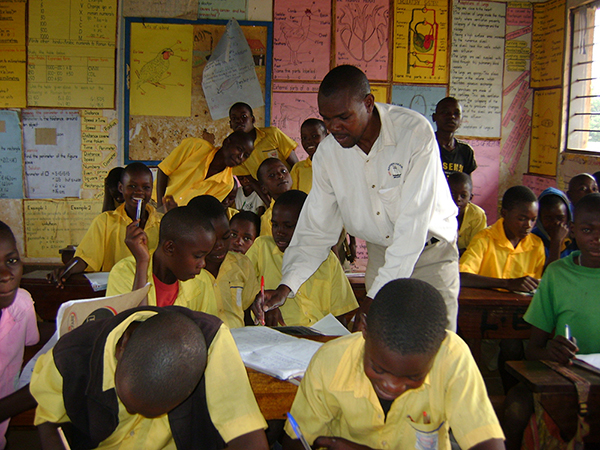 Paul Mudhasi, a former sponsored child in Uganda, now teaches in the primary school he attended as a child.